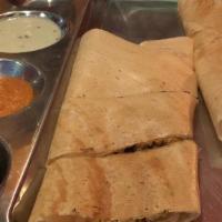 Paneer Dosa · Fermented rice and lentil crepe with cottage cheese and spices.