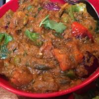 Vegetable Kurma · Mixed vegetables cooked in a coconut based gravy.
