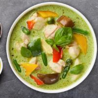Green Curry · Served with eggplant, carrots, bell pepper, and basil.