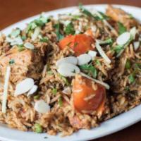 Lamb Biryani · Basmati rice cooked with lamb, nuts and spices.