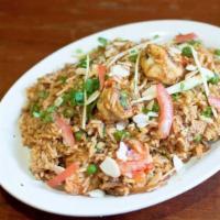 Prawn Biryani · Basmati rice cooked with shrimp, nuts and spices.