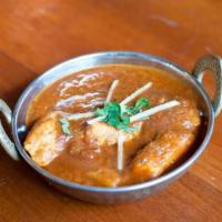 Chicken Vindaloo · Boneless chicken with potatoes, cooked in a hot and spicy curry.