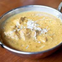Chicken Rasala · Chicken cooked in coconut curry.