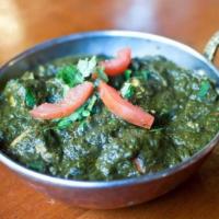 Chicken Saag · Chicken cooked in spinach, with mild spices.