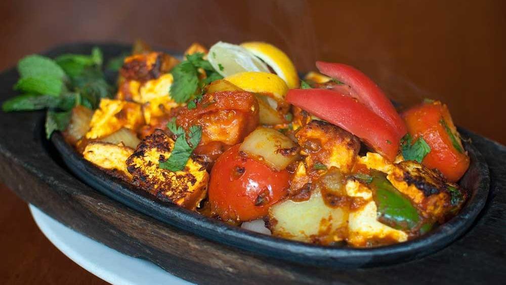 Paneer Shashlyk Tandoori · Marinated cubes of farmer's cheese with bell peppers, onions, tomatoes and spices.