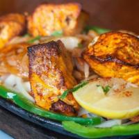 Fish Tandoori · Seasonal fish marinated with herbs and spices, grilled in our clay oven.