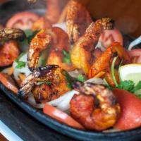 Shrimp Tandoori · Shrimp with herbs and spices, grilled in our clay oven.