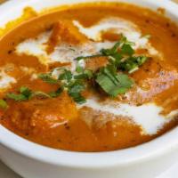 Paneer Makhani · Cubes of cottage cheese cooked with tomatoes and butter curry.