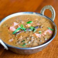 Daal Makhani · Creamed lentils delicately cooked with Indian spices.