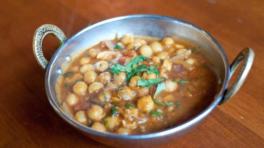 Chana Masala · Garbanzo beans cooked in Indian spices.