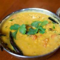 Daal · Lentils delicately cooked with Indian spices.