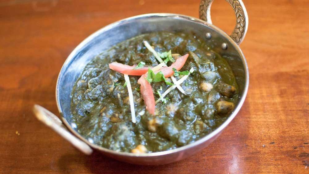 Chana Saag · Garbanzo beans with spinach, cooked in Indian spices.