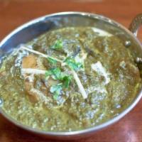 Aloo Saag · Potatoes with spinach, cooked in Indian spices.