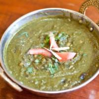 Daal Saag · Lentils and spinach cooked with Indian spices.