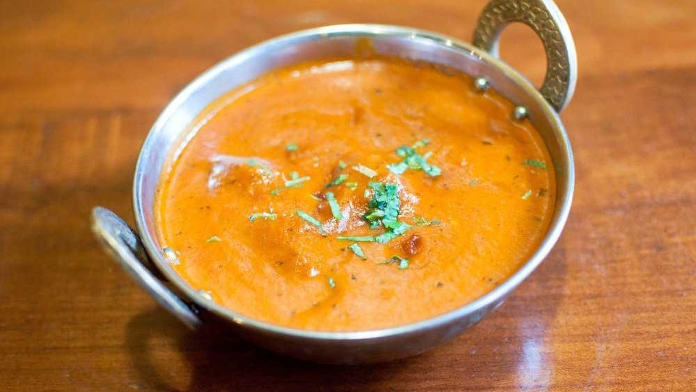 Lamb Tikka Masala · Diced tandoori lamb cooked in a creamy sauce, with tomatoes and spices.