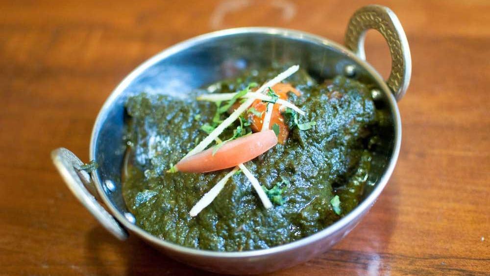 Lamb Saag · Lamb cooked in a spinach curry.
