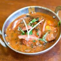 Fish Curry · Seasonal fish cooked with tomatoes, herbs and spices.