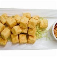 Tofu Nuggets · Batter fried tofu served with sweet and sour sauce.