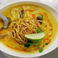 Khao Soi · Curry egg noodles special curry with egg noodles served with red onion, pickled mustard and ...
