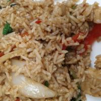 Basil Fried Rice · Jasmine rice pan fried with choice of meat, garlic, chili, yellow onion, bell pepper and basil