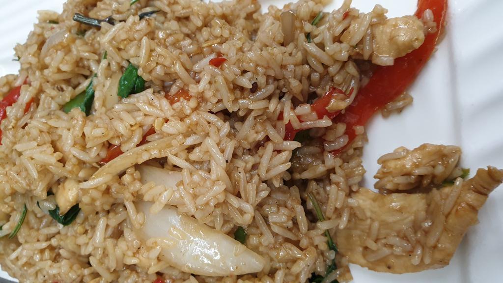 Basil Fried Rice · Jasmine rice pan fried with choice of meat, garlic, chili, yellow onion, bell pepper and basil