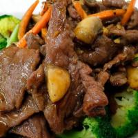 Beef Oyster Sauce · Sauteed beef with garlic, mushroom, green onion, served with over steamed broccoli.   (A la ...