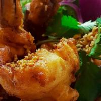 Garlic Prawn · Batter jumbo prawn with garlic and black pepper sauce sprinkled with fried garlic and cilant...