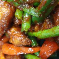 Flaming Fish · Batter tilapia fillet then sautéed with homemade curry paste, green bean, bell pepper, and k...