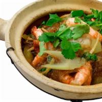 Prawn's Clay Pot · Jumbo prawn with silver noodles, ginger, celery, and black pepper served within clay pot.