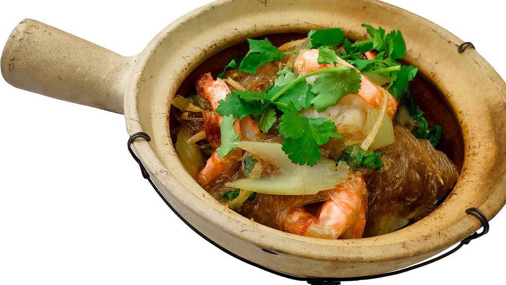 Prawn's Clay Pot · Jumbo prawn with silver noodles, ginger, celery, and black pepper served within clay pot.