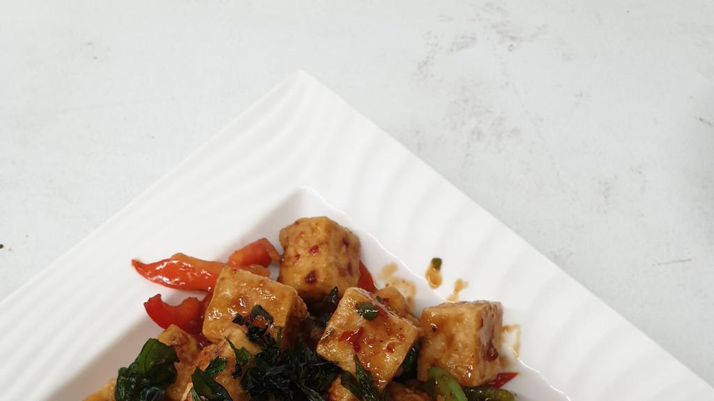Spicy Tofu · Crispy tofu in spicy tamarind sauce with bell pepper and basil.