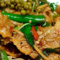 Pad Cha Catfish · Deep-fried catfish fillet, Sautéed in spicy homemade curry paste with basil, wild ginger, gr...