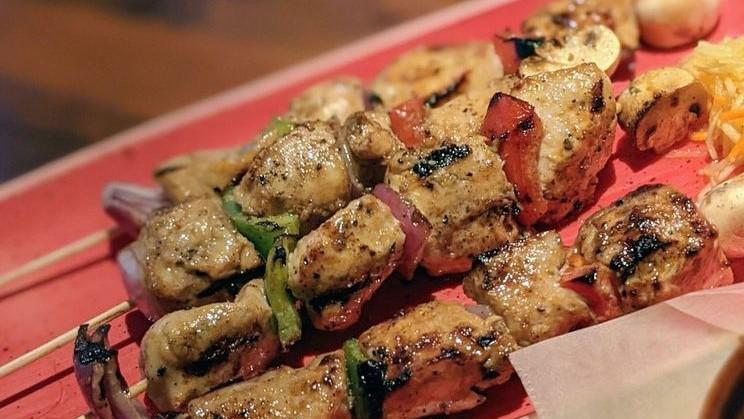 Chicken Skewers  · Grilled chicken breast, bell peppers, mushrooms, and onions.
