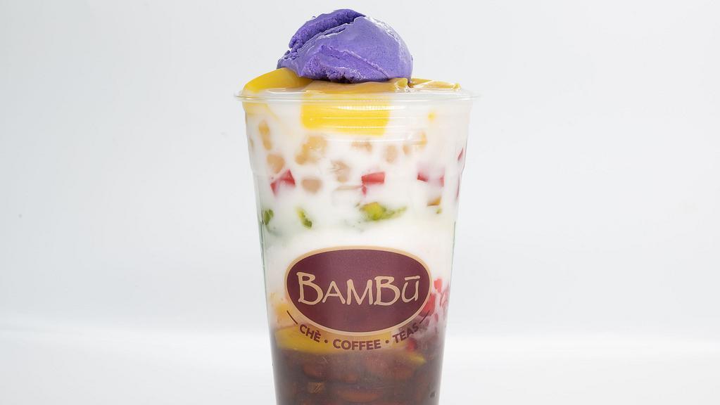 Bambu Halo Halo · Filipino  favorite Bambu Style served in a LARGE 24 oz Cup,  Red Beans, Red Tapioca, Pandan Jelly, Jackfruit,  Fresh Coconut Meat,  Egg Pudding, Crystal Boba, Rainbow Jellies, and Topped with a Scoop of Ube Ice Cream.  590 Cal