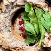 Naz Khatoun  · Gluten free. Vegan.  Roasted Eggplant, Walnut, Herbs, Pomegranate juice & vinegar.
