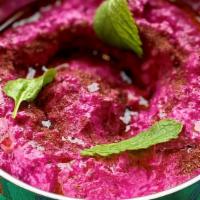 Beet Yogurt / Maast O Labou · Red beet, sumac, plain yogurt, labneh, whey, basil, mint, salt, black pepper, and olive oil....