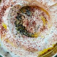 Sumac Labneh · Vegetarian. Labneh with sumac, mint, olive oil and Komaaj seeds mix