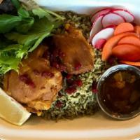 Herb Rice with Turmeric Chicken Thigh · Gluten free. Herb rice with a turmeric-roasted chicken thigh.