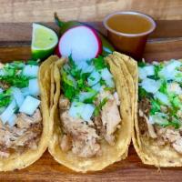 Taco · Choice of meat, onion, cilantro, salsa.