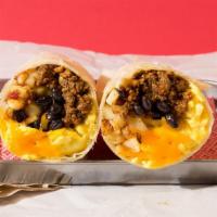 Classic Breakfast Burrito · Breakfast burrito filled with chorizo, carnitas, or asada with eggs, cheese, pico de gallo, ...