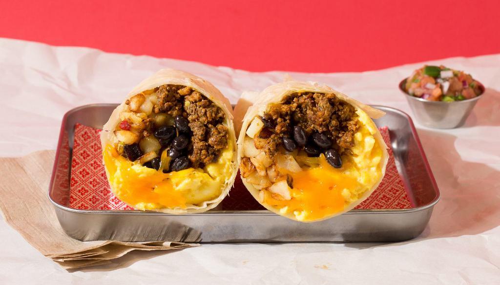 Classic Breakfast Burrito · Breakfast burrito filled with chorizo, carnitas, or asada with eggs, cheese, pico de gallo, rice, and beans, and served with a side of salsa.