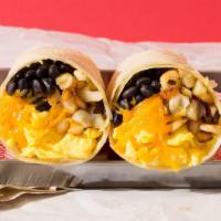 Vegetarian Breakfast Burrito · Breakfast burrito filled with eggs, sauteed onions and peppers, cheese, pico de gallo, rice,...