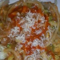 Flautas  · 2 crispy tortillas rolled with cheese and your choice of meat, topped with guacamole, sour c...