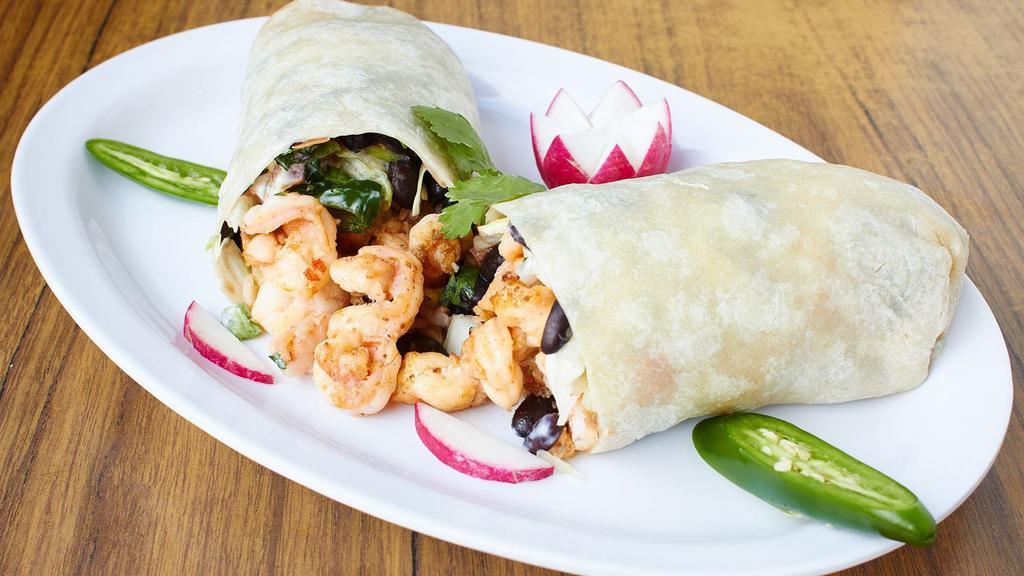 Prawns Seafood Burrito · With rice, beans and salsa. Make it super by adding cheese, guacamole, sour cream, lettuce and tomato; or make it mojado by smothering it in a savory sauce and topping it with cheese.