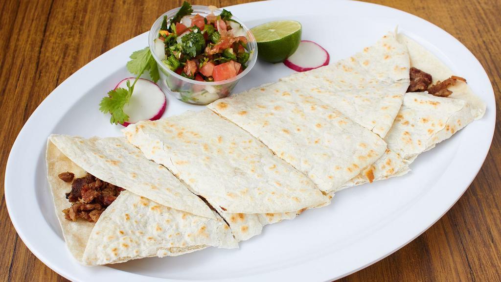 Super Quesadilla · With cheese, choice of meat, sour cream, lettuce, tomato and salsa. Make it super by adding cheese, guacamole, sour cream, lettuce and tomato; or make it a dinner by adding rice, beans, salad and tortillas.
