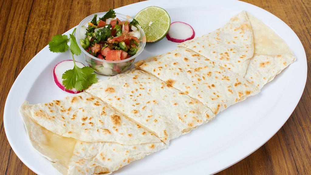 Flour Quesadilla · Flour quesadilla with cheese and salsa. Make it super by adding cheese, guacamole, sour cream, lettuce and tomato; or make it a dinner by adding rice, beans, salad and tortillas.