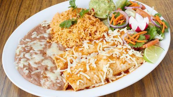 Enchiladas (2) · Vegetarian, gluten-free. Hand rolled with choice of meat or cheese and covered with enchilada sauce.