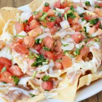 Nachos (No Meat) · House Made Corn Chips, beans, cheese and salsa. Make it super by adding cheese, guacamole, s...