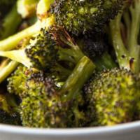 Broccoli 5lbs · Florets steamed and seasoned with sesame, sea salt, garlic and pepper.