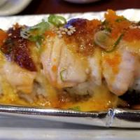 Super Lion King Roll (6-8) · Six to eight pieces. Salmon and unagi over snowcrab and avocado, baked with house sauce.